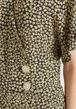 Khujo Borgia - Jumpsuit - Schwarz-Gelb Geblümt -Khujo Verkoopwinkel af379724558d423ab9f19f8031bf325d